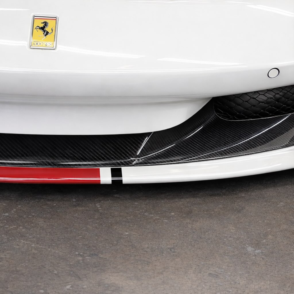 Restored Ferrari F8 front carbon fiber detail with a glossy finish